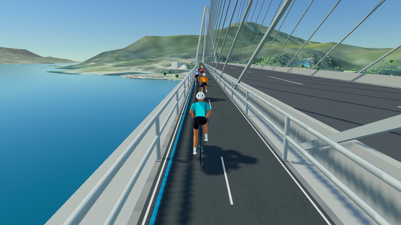 しまなみ海道の橋の上を走るライダーを後ろから見た画面